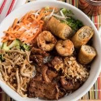 #41. Bun Anh Duong Dac Biet · Special vermicelli noodle bowl with grilled pork, egg rolls, shrimp, shredded pork and mixed...