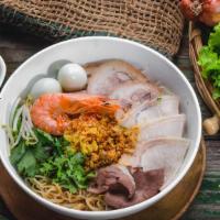 #64. Hu Tieu Anh Duong · Combination of seafood, slices of char siu pork, quail eggs and shrimp cake.