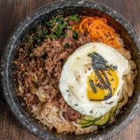 M80 Combo Bibimbap · 6 kinds of cooked vegetables over rice with sided homemade spicy sauce.