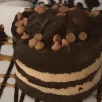 Chocolate Peanut Butter Explosion Cake · Rich Chocolate Cake, Peanut Butter Filling, Chocolate Ganache