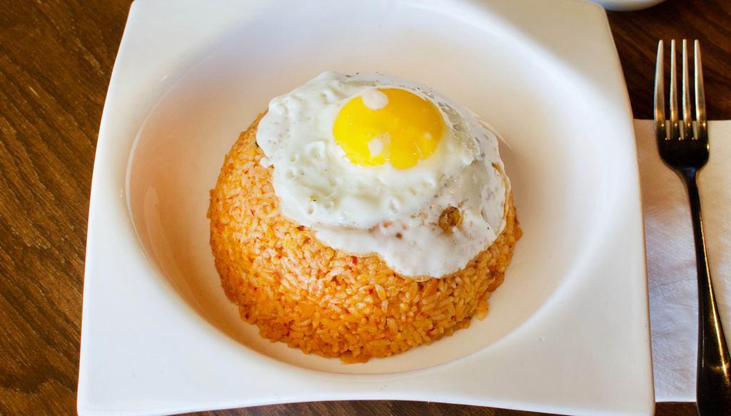 Kimchi Fried Rice · Kimchi fried rice with spam and fried egg.