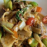 L3 Drunken Noodle · Spicy.  Stir-fried flat rice noodle with bell pepper, onion, basil, egg, scallion, tomato wi...