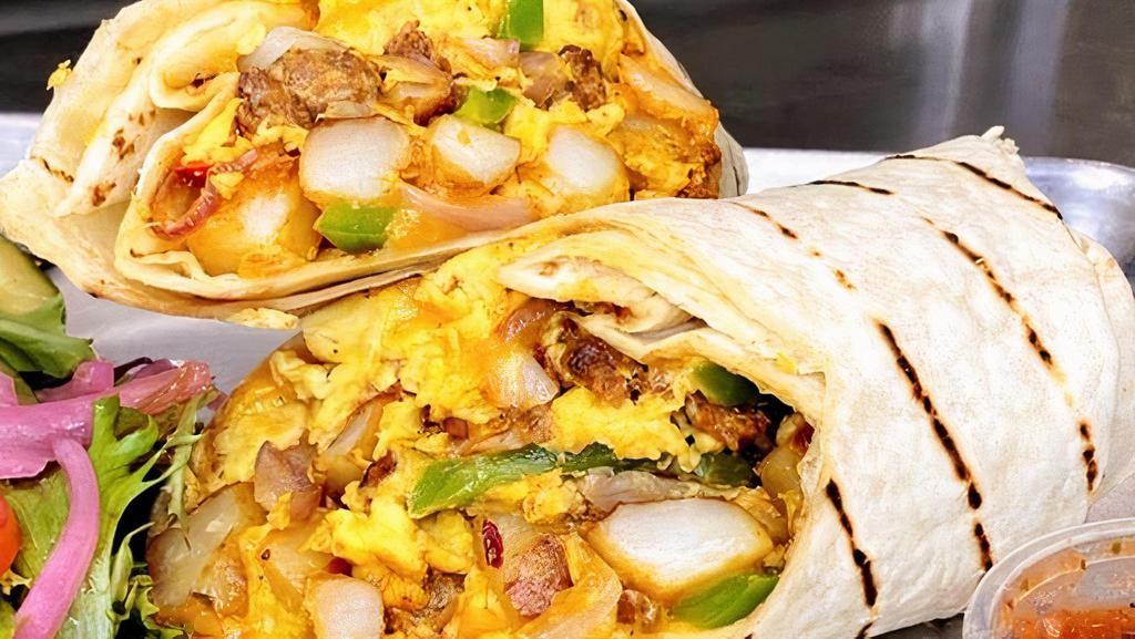 Bw Breakfast Burrito - No Meat · Our robust burrito with potatoes, scrambled eggs, grilled onions and peppers with your choice of house made chorizo, grilled Italian sausage, thick cut bacon, or grilled Portobello. Served with our house made roasted tomato salsa