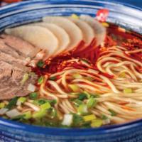 Signature Beef Noodle · Sliced beef shank seasoned with Chinese herbs, Radishes, Cilantro, and Green Onions, with a ...