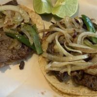 Lomo / Rye Eye Steak · Los tacos se sirven con jalapeñoy cebolla dorada . /  tacos are served with grilled jalapeño...