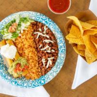 Taquitos · Two deep-fried corn tortillas filled with shredded chicken or shredded beef rolled, deep-fri...