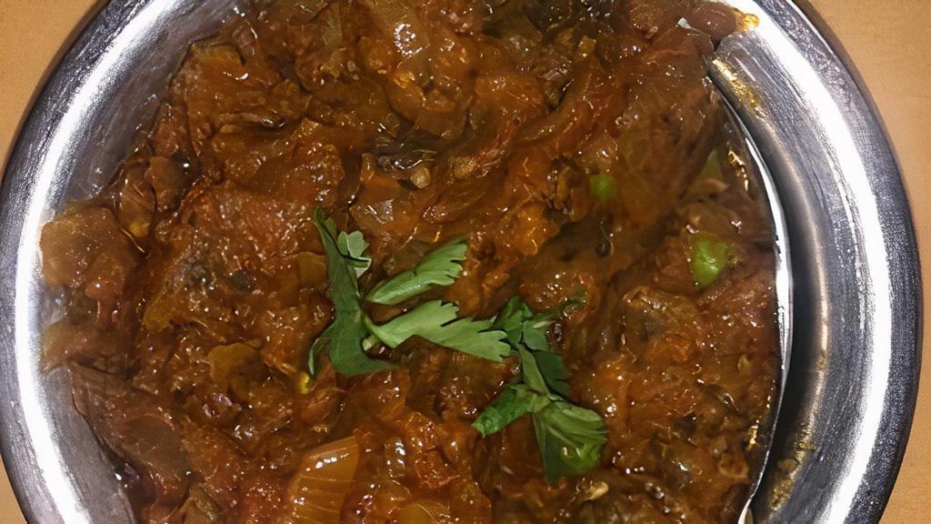 Baigan Bharta · Eggplant cooked with herbs and spices.