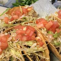 Veggie Taco · Hard Or Soft Corn Tortilla With Veggie,  Plus Cheese, Sour Cream, Lettuce, And Tomatoes.