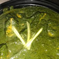 Chicken Saag · Marinated chicken pieces and spices cooked with cream spinach. Served with basmati rice.