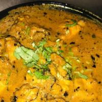 Chicken Methi · Boneless chicken cooked with fenugreek, herbs and spices. Served with basmati rice.