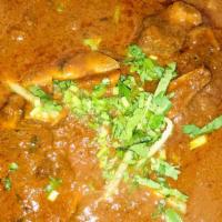 Goat Curry · Fresh goat curry cooked with freshly ground spices. Served with basmati rice.