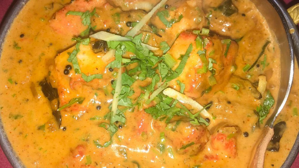 Goa Fish Curry · Fish cooked in a coconut and cream sauce. Served with basmati rice.