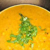 Daal Tadka · Vegetarian. A mixture of lentils cooked with tomatoes and onions tempered with chilies, garl...