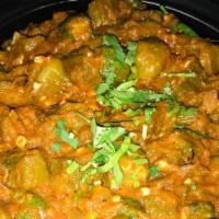 Bhindi Ki Sabzi · Vegetarian.Fresh okra stir-fried with onions, tomatoes and spices. Served with basmati rice.