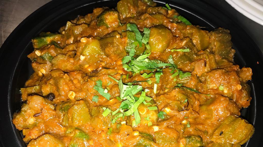 Bhindi Ki Sabzi · Vegetarian.Fresh okra stir-fried with onions, tomatoes and spices. Served with basmati rice.