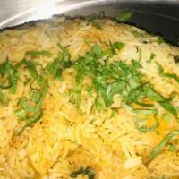 Chicken Dum Biryani · Basmati rice and cubes of chicken cooked with exotic spices and rose water. Served with yogu...