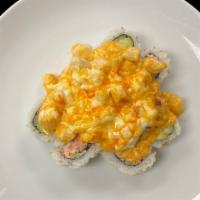 Volcano Roll · Volcano Roll- inside: avocado, crab mix, cucumber. Outside: 
*cooked spicy crawfish, chives
...