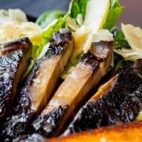 Grilled Portobella Salad · Romaine Lettuce, Shaved Parmesan, Grilled Portobello mushroom, drizzled with champagne vinai...