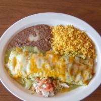 Chile Verde Burrito · Flour tortilla filled with steak, spicy salsa, red onions, and green chilies, topped with gr...