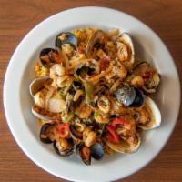 Paella Marinara · Clams, shrimp, mussels, and calamari simmered in a saffron and caper sauce, served over rice.