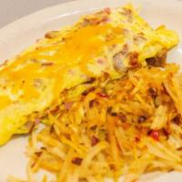 Meat Lover'S Omelet · bacon, sausage, ham, and cheddar to boot
