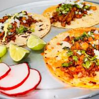 Tacos · We have home made corn tortillas, meat choice 
Beef, pastor  tinga de pollo , chicharrón, ca...