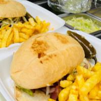 Torta Cubana Combo  · Served with meat choice and , bacon,ham, sausage, lettuce, tomato, onion, avocado, refried b...