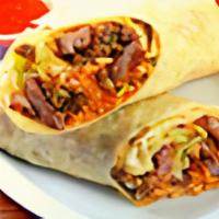 Burrito · Meat choice beef, tinga, chicharrón,campechano, pastor or birria - served with refried beans...