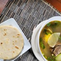 Sopa De Res (Beef Soup) · Latin style beef soup w/ vegetables, yucca, corn, chayote & tortillas