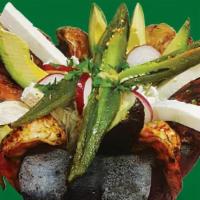 Molcajete Mi Mexico Lindo · Prepared with the most fresh ingredients, chicken, beef, spicy pork, cactus, avocado, scalli...