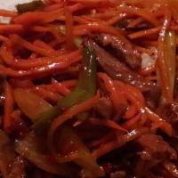 Beef Szechuan · Shredded beef with shredded carrots and celery in spicy sauce.