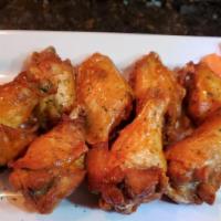Jumbo Party Wings · With choice of flavors served with celery and ranch and bleu cheese dressing.