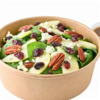 Baby Spinach And Apple Salad · Baby spinach, apple, feta cheese, dried cranberries, house roasted pecans and pomegranate dr...