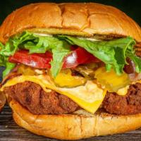 Spicy Chick'N · Breaded fried chicken, cheddar, bacon, mayo-sirracha, lettuce, tomato, pickles.