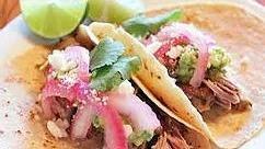 Fish Tacos (Baja California) · Seared mahi mahi, Mexican slaw, house-pickled chiles.