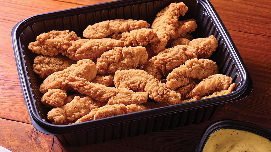 Chicken Tenders - Serves 6-8 · Crispy breaded chicken tenders are a grill and bar classic.. Served with honey Dijon mustard.. Serves 6-8
