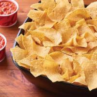 Chips & Salsa - Serves 6-8 · Freshly made white corn tortilla chips and our chipotle lime salsa.. Serves 6-8