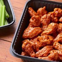 Double Crunch Bone-In Wings (Serves 10-12) · Twice battered and fried, these crisp outside, tender inside wings are tossed in your choice...