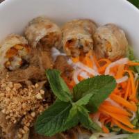 Rice Vermicelli  & Crispy Spring Rolls · Rice vermicelli, 3 crispy spring rolls, lettuce, daikon, cucumber, basil, served with fish s...