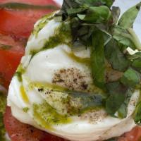 Burrata Mozzarella · creamy burrata, tomatoes, basil-olive oil