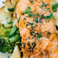 Salmone · grilled salmon, wood-fired vegetables, roasted potatoes, lemon & capers olive oil