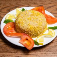 Vegetable Fried Rice · Basmati fried rice with veggies. Comes with yogurt sauce.