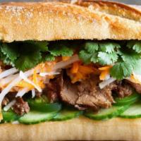 Grilled Beef (Banh Mi) · Includes grilled beef, daikon, cucumber, cilantro, jalapeños, and mayo sauce.