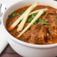 Goat Korma · Cooked in a curry with fresh tomatoes, onions, yogurt and spices.