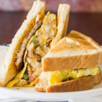 Hobo · A breakfast sandwich with your choice of meat with egg, home fries with onions and green pep...
