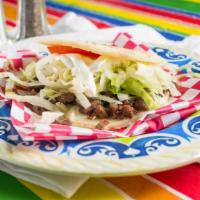 Gorditas · A pastry made with masa and stuffed with cheese, lettuce, tomatoes, sour cream and choice of...