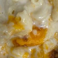 Mac N Cheese · White Cheddar mac topped with Sharp Cheddar, Mozzarella and Parmesan