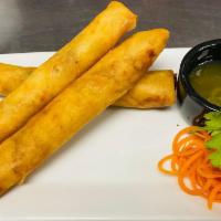 Crispy Spring Roll · Fried veggie spring roll and served with sweet Carrot sauce