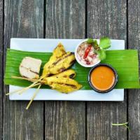 Satay Chicken · Grilled marinated chicken in skewers served with peanut sauce and cucumber relish