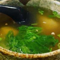 Wonton Soup · Shimp and chicken dumplings wrapped in wonton skin in cleared chicken broth